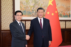 習近平聽(tīng)取李家超述職報告